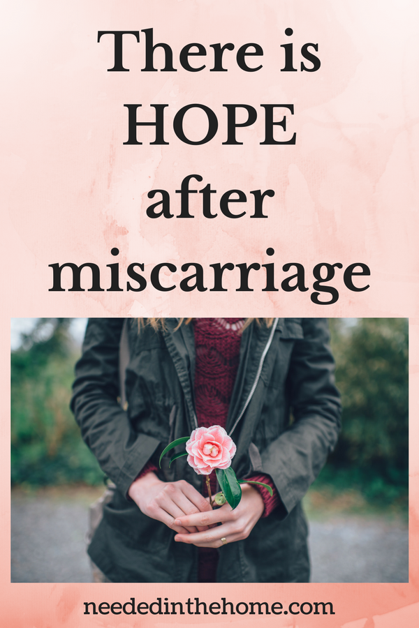 There is hope after miscarriage woman holding a pink rose at child's funeral neededinthehome