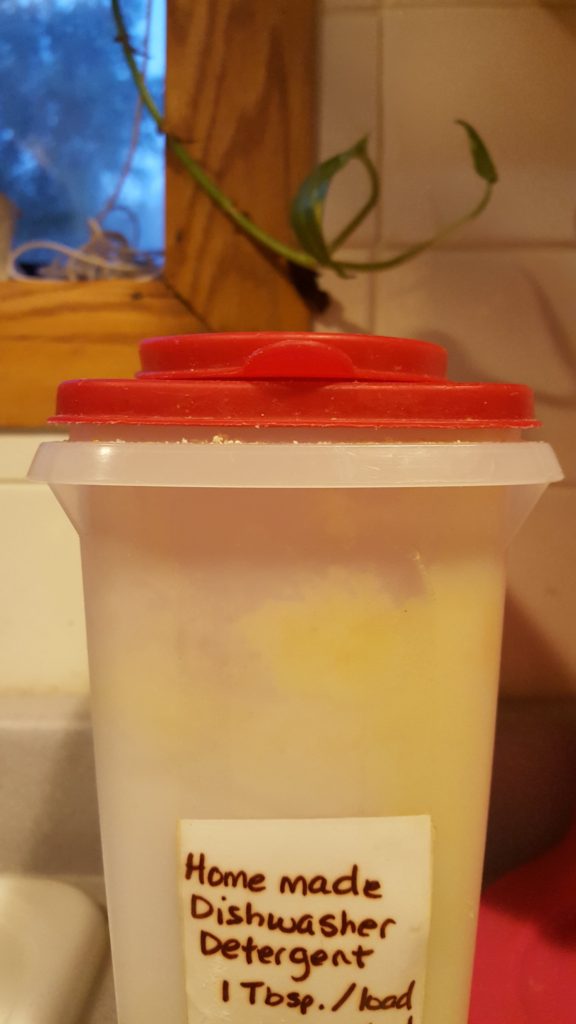 Homemade cleaning recipes image homemade dishwasher detergent 1 Tbsp per load in plastic container red lid kitchen