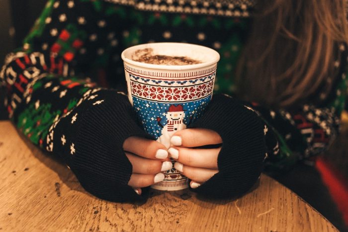 teen girl holding cocoa in snowman cup But Family, It's Cold In Here!