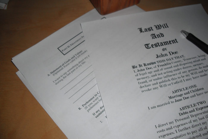 paper documents of a last will and testament and a pen Making Sure Your Family will be okay without you