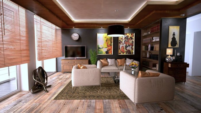 living room with hardwood floors and blinds and furniture