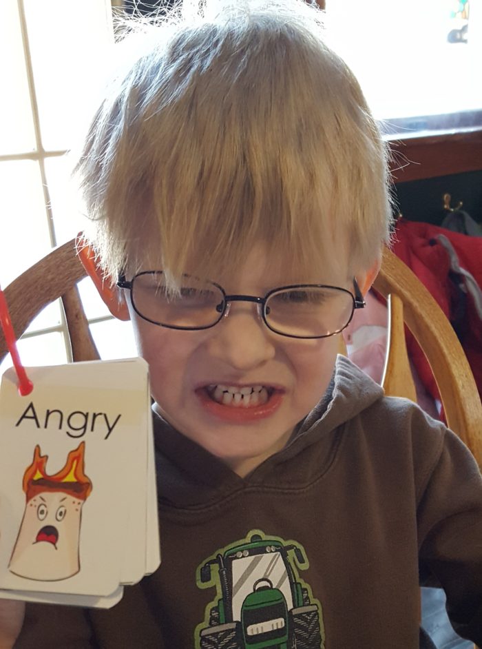 angry blond boy in glasses with flipper feelings cards from haley sez