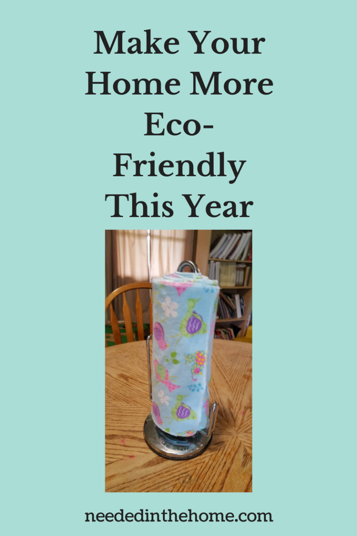 reusable paper towels on a metal towel holder on dining room table chair bookcase window Make Your Home More Eco-Friendly This Year neededinthehome.com