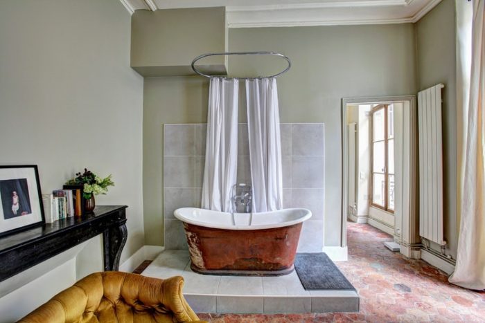 elegant bath tub tile shower curtain marble mantle greenery window your bathroom deserves to be dripping in luxury