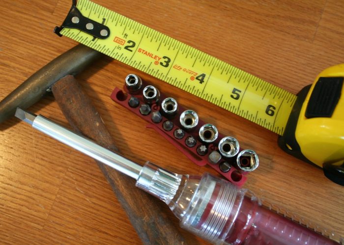 5 Ways To Make Home Repairs More Affordable screwdriver tape measure tools