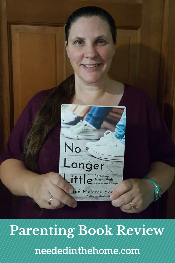 No Longer Little by Hal and Melanie Young parenting book review mom of 7 children holding book neededinthehome