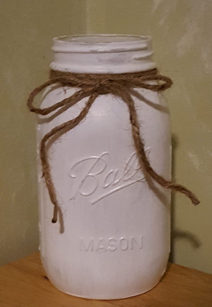 Mason Jar Crafts painted mason jar with a jute twine tie