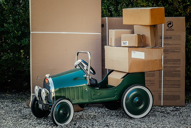 When starting a delivery business vehicle time payments physical limits green old style toy car cardboard boxes packages