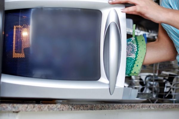 Clean a microwave gloved hand