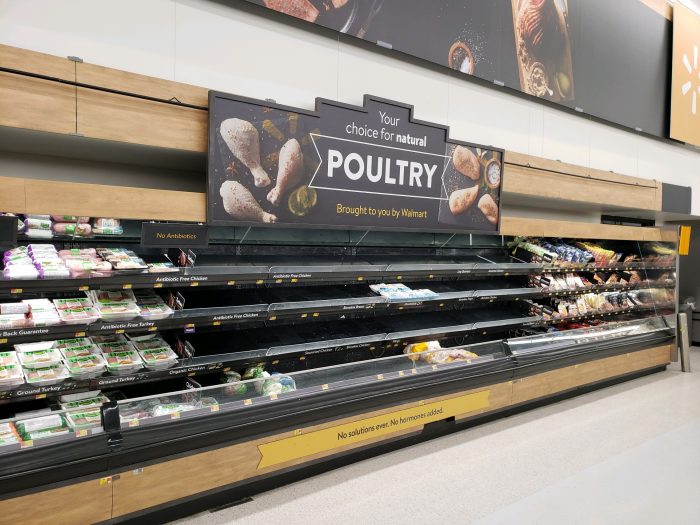 empty poultry shelves at walmart store