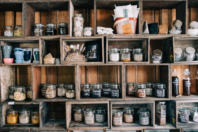 pantry organized wood shelves glass jars