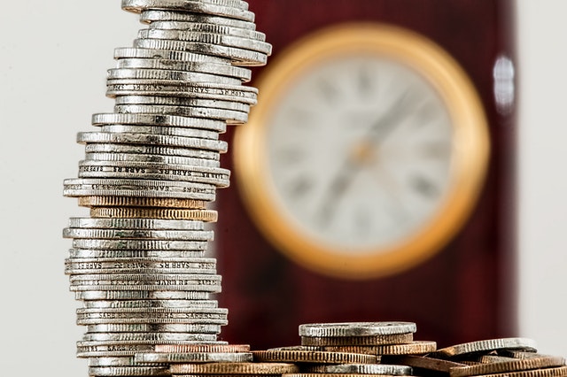 Simple Tricks To Saving Money coins clock