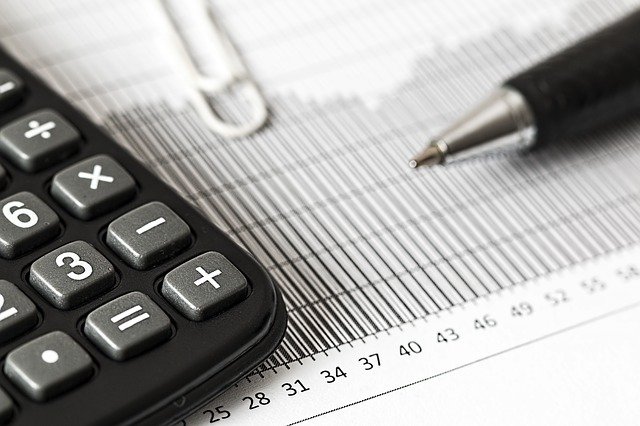basic financial management calculator pen spreadsheet