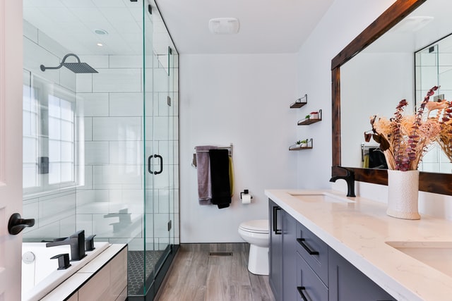 home hygenically clean bathroom towels sink toilet shower floor tub