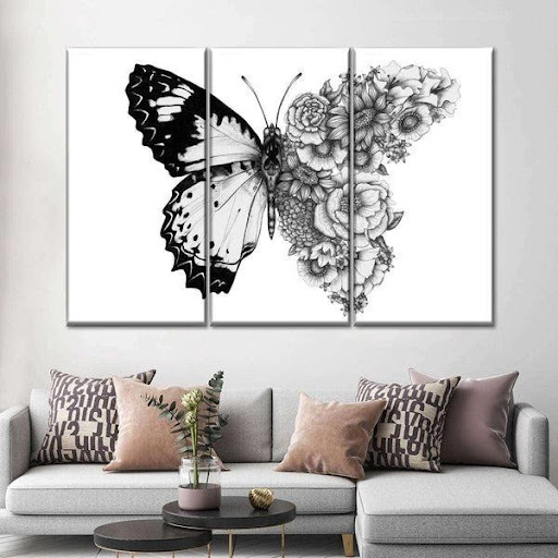 black and white wall art above couch in living room