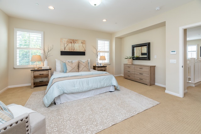 improve your home bedroom bed dresser side tables chair light blue and beige color scheme