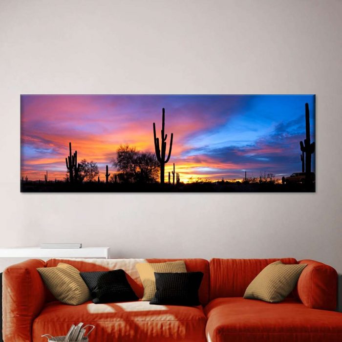 maximalist decor trend cafe desert wall art cactus sunset silhouette sofa pillows