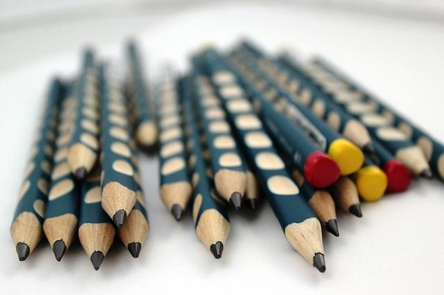 interesting homeschooling stack of pencils pointed toward viewer