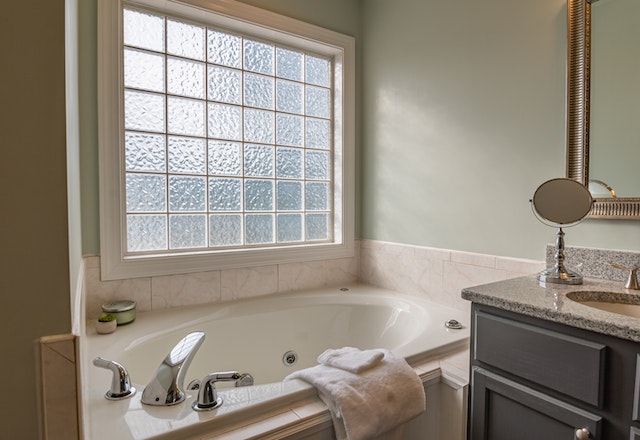 protect bathroom from mold towels to dry out the bathtub on side of tub near sink counter