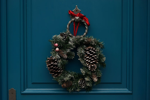 family activities wreath on door