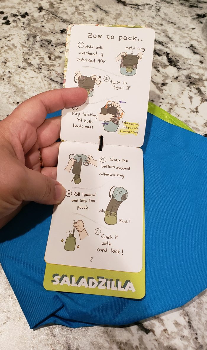 flip tag held open to show how to pack instructions for the saladzilla salad spinner