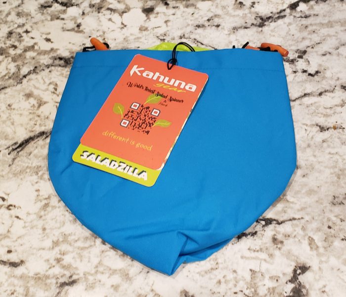 The blue water catchment pouch with the Kahuna Gear Saladzilla tag on it