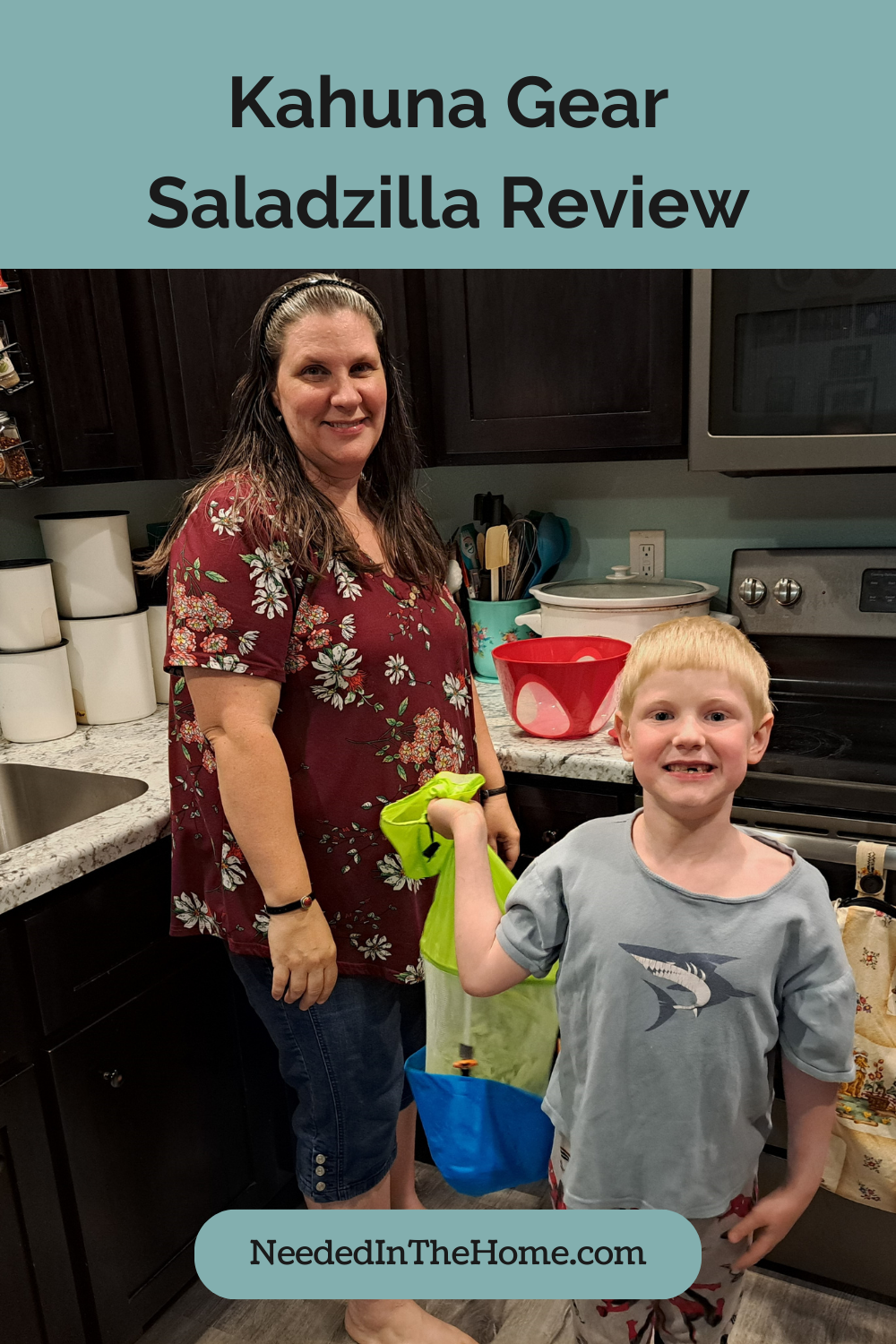 kahuna gear saladzilla review mom and son smiling in kitchen with the boy holding the salad spinner neededinthehome