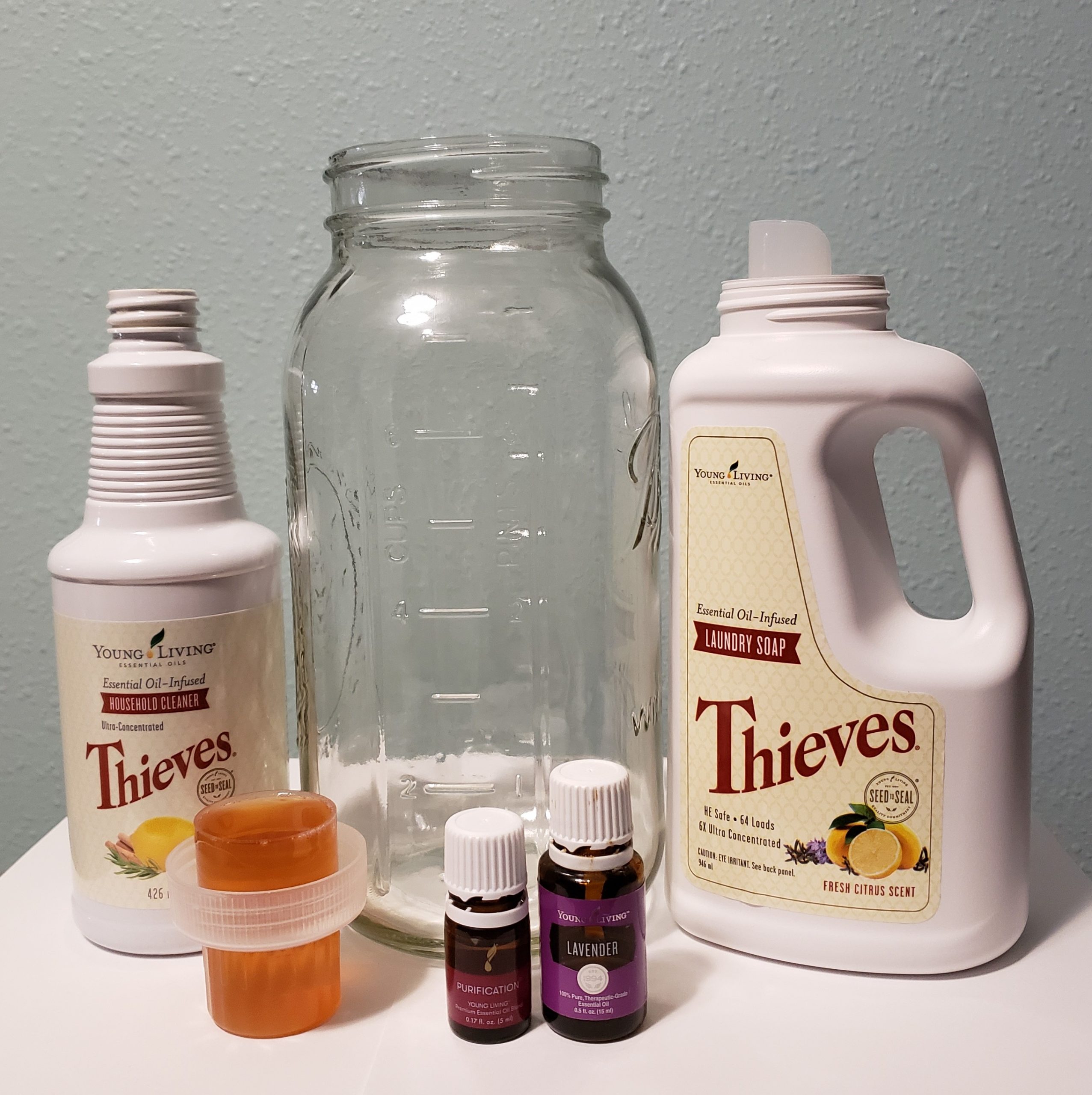 young living thieves household cleaner large glass jar thieve laundry soap cap of cleaner purification blend and lavender essential oil