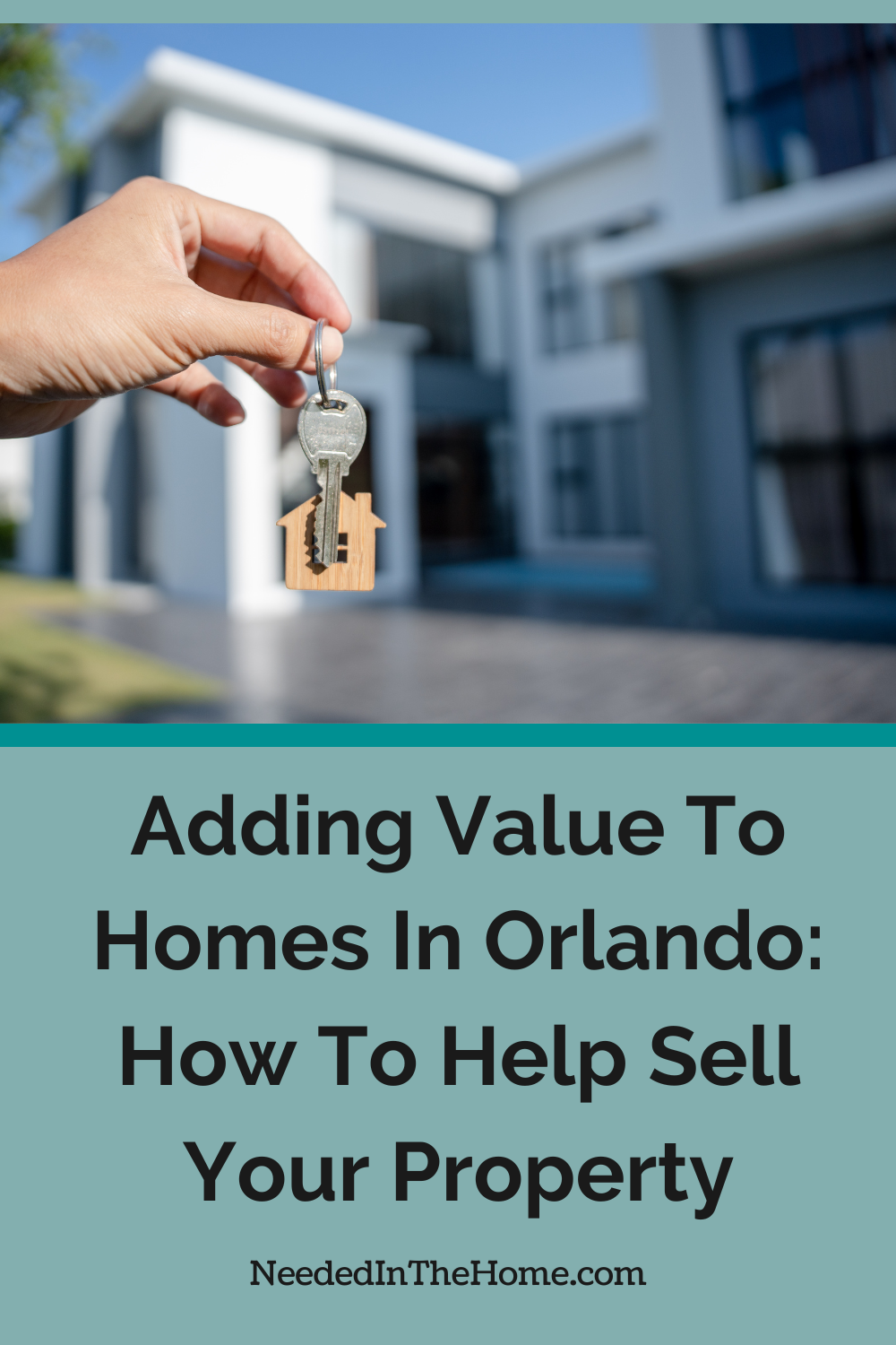 hand holding key to home in front of two story home adding value to homes in orlando how to help sell your property neededinthehome