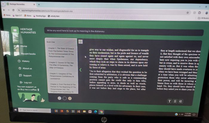 a computer screen with an online book that has a black page and white letters