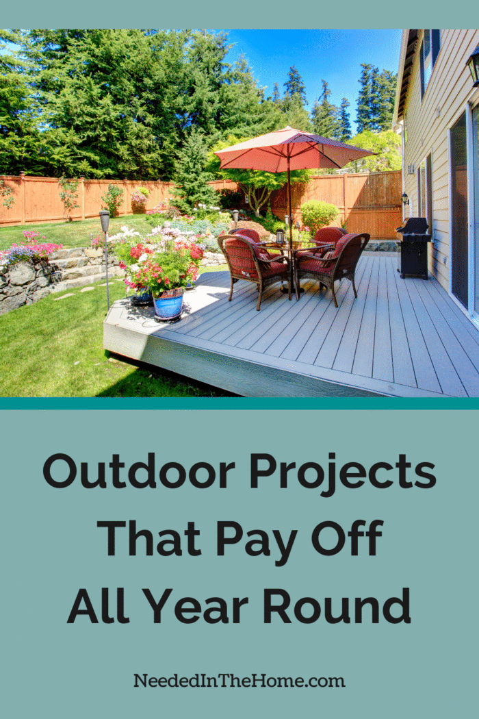 backyard deck with furniture and umbrella landscaping in yard and privacy fence outdoor projects that pay off all year round neededinthehome