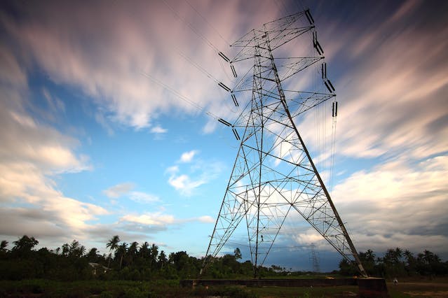 electrical wires against blue sky