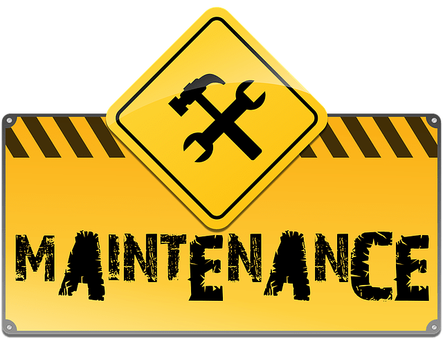 yellow construction maintenance sign