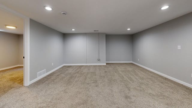 room with an extended wall to make a larger space