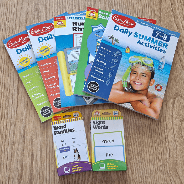 evan moor educational resources with five workbooks and two boxes of reading flash cards