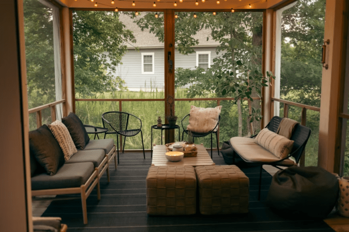 large sunroom with fairy lights and furniture