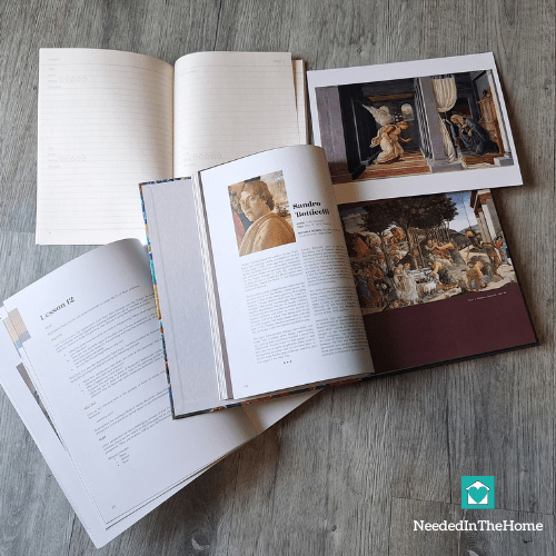 set of materials from an art history curriculum laid out for use by a homeschooler