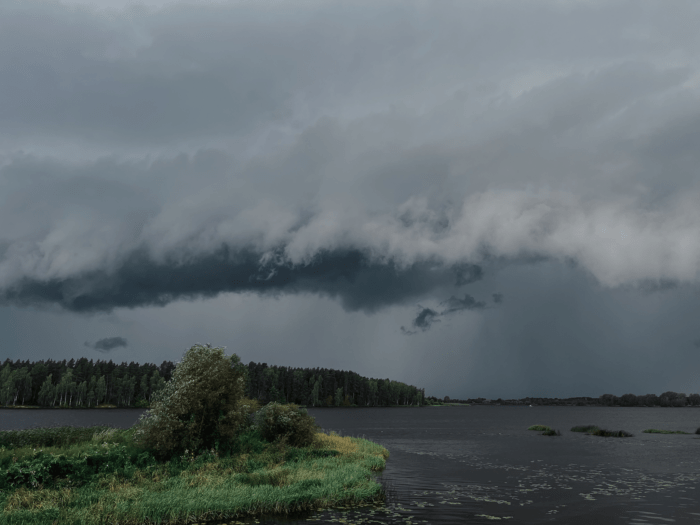 dark clouds above river