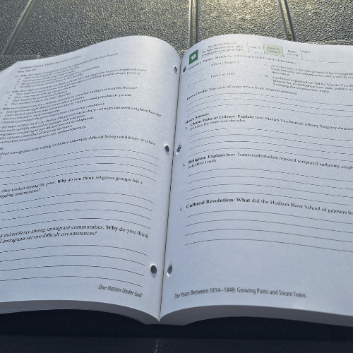 teacher guide open to a page of questions