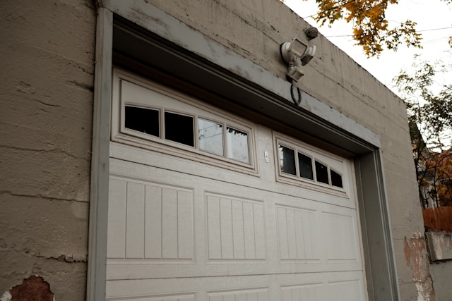 Lots of common garage door issues have easy fixes you can do yourself, without even needing to call for help. garage with double wide garage door