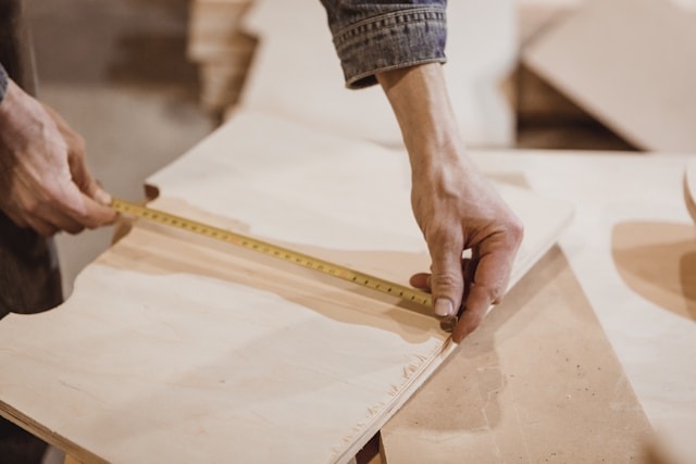 measuring wood to cut for home repair