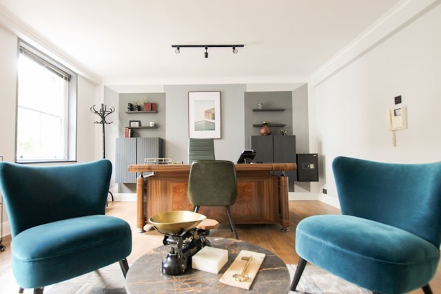 The same ideas that make an app feel good - our user experience, can be applied at home in furniture placement and more. living room with desk in background