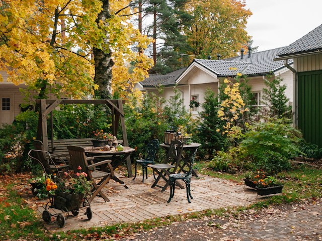 houses with brick patio chairs wooden swing